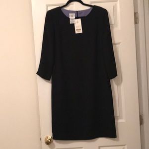 Black crepe dress with periwinkle lining.